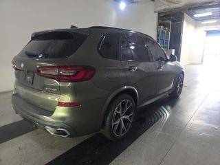 Photo of 2023 Manhattan Green Metallic BMW X5