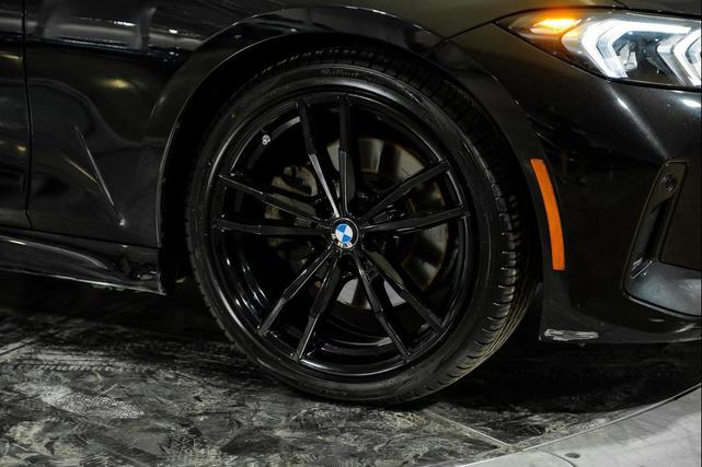 Photo of 2024 Black Sapphire Metallic BMW 330