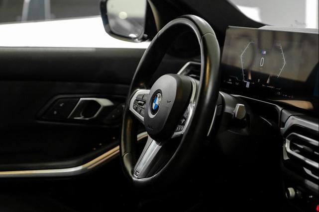 Photo of 2024 Black Sapphire Metallic BMW 330