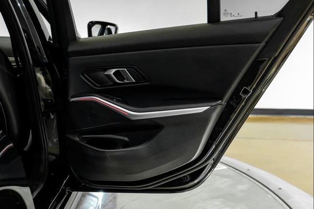 Photo of 2024 Black Sapphire Metallic BMW 330