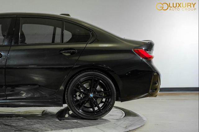 Photo of 2024 Black Sapphire Metallic BMW 330