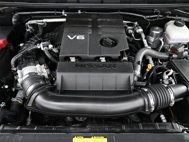 Photo of 2023 Glacier White Nissan Frontier