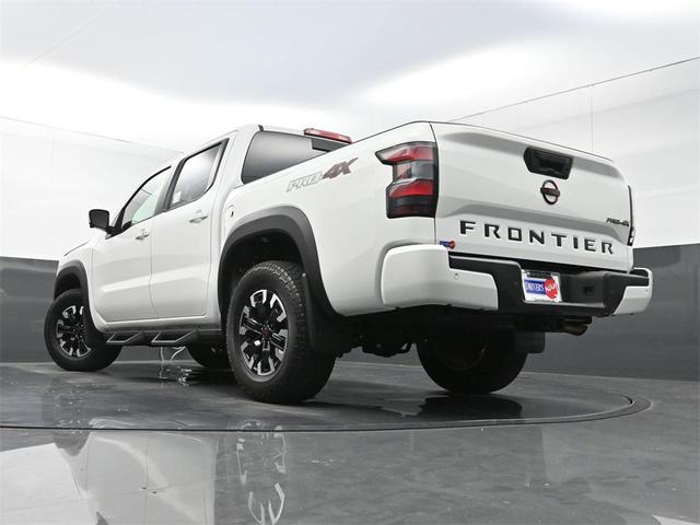 Photo of 2023 Glacier White Nissan Frontier