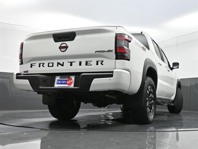Photo of 2023 Glacier White Nissan Frontier
