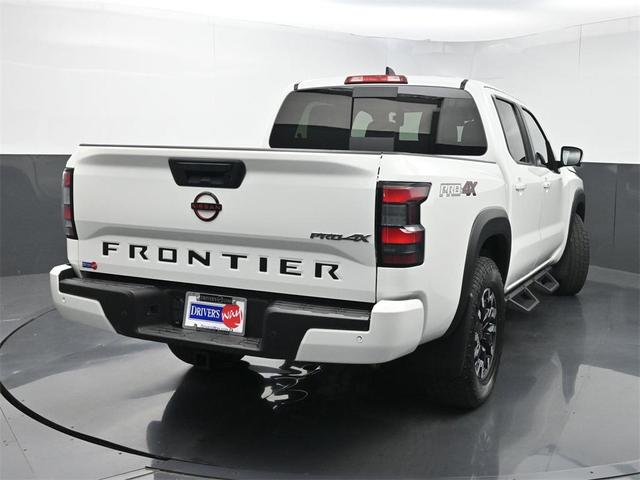 Photo of 2023 Glacier White Nissan Frontier