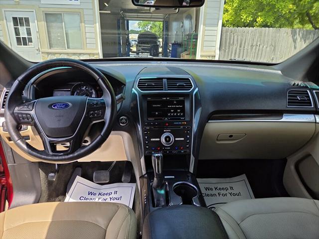Photo of 2016 Ruby Red Metallic Tinted Clearcoat Ford Explorer