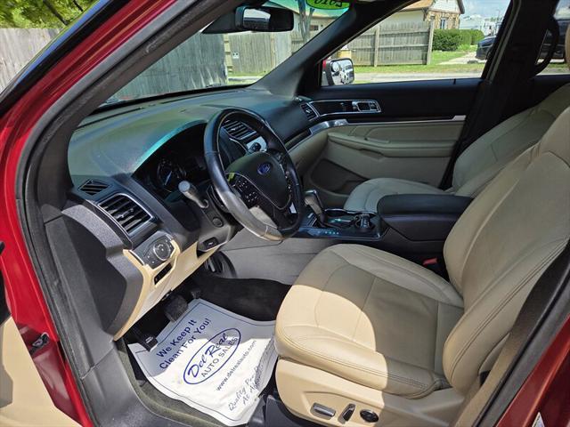 Photo of 2016 Ruby Red Metallic Tinted Clearcoat Ford Explorer