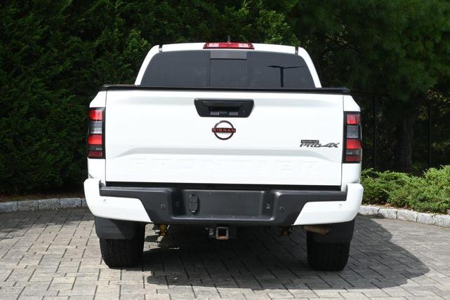 Photo of 2023 Glacier White Nissan Frontier