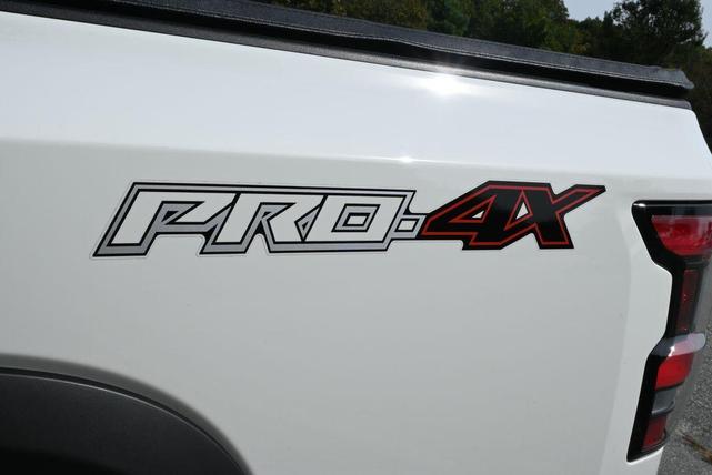 Photo of 2023 Glacier White Nissan Frontier