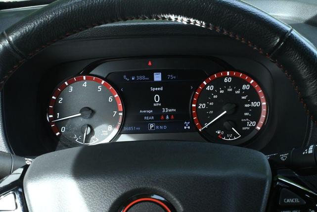 Photo of 2023 Glacier White Nissan Frontier