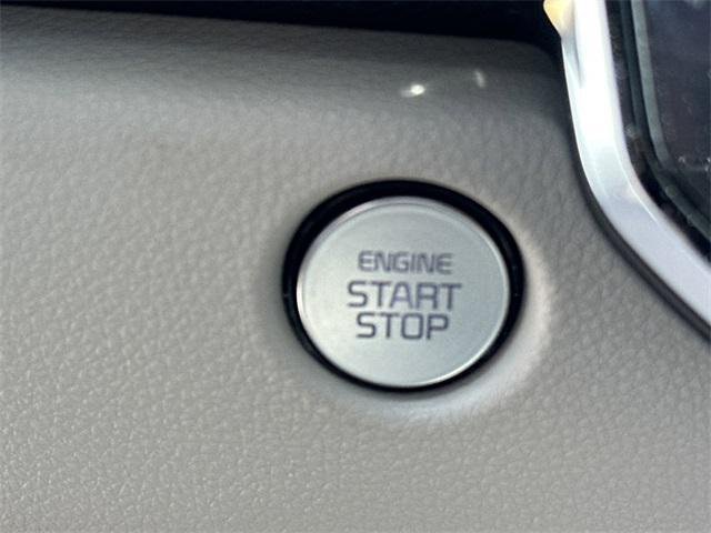 Photo of 2026 Snow White Pearl Kia Carnival Hybrid