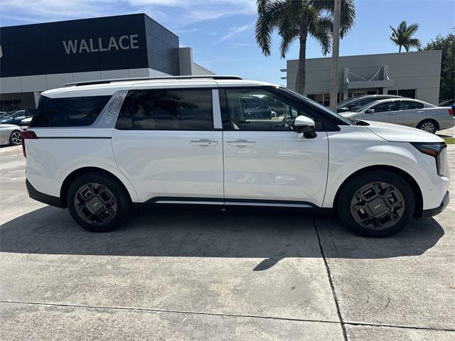 Photo of 2026 Snow White Pearl Kia Carnival Hybrid