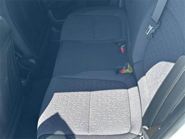 Photo of 2025 Clear White/Black Roof Kia Seltos