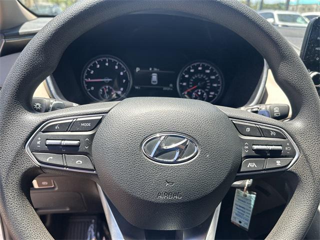 Photo of 2023 Serenity White Pearl Hyundai SANTA FE