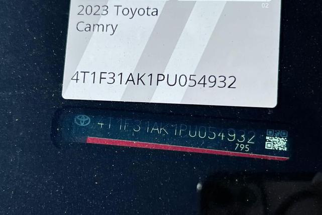 Photo of 2023 Supersonic Red Toyota Camry Hybrid