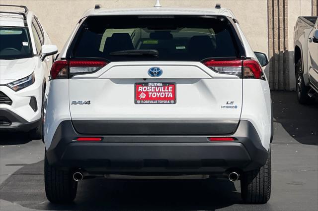 Photo of 2022 White Toyota RAV4 Hybrid