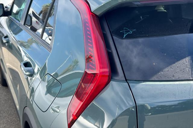 Photo of 2023 Cityscape Green Kia Niro