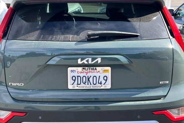 Photo of 2023 Cityscape Green Kia Niro