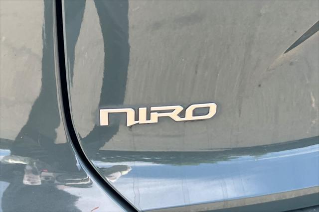 Photo of 2023 Cityscape Green Kia Niro