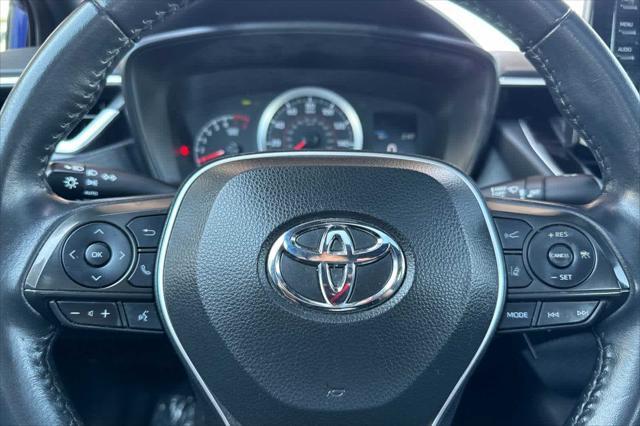 Photo of 2022 Blue Crush Metallic w/Black Sand Pearl Roof Toyota Corolla