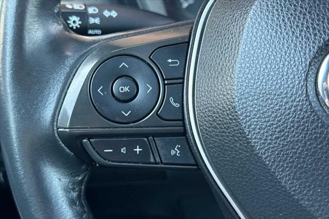 Photo of 2022 Blue Crush Metallic w/Black Sand Pearl Roof Toyota Corolla