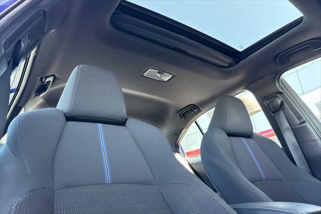 Photo of 2022 Blue Crush Metallic w/Black Sand Pearl Roof Toyota Corolla