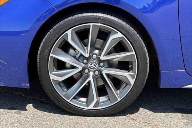 Photo of 2022 Blue Crush Metallic w/Black Sand Pearl Roof Toyota Corolla