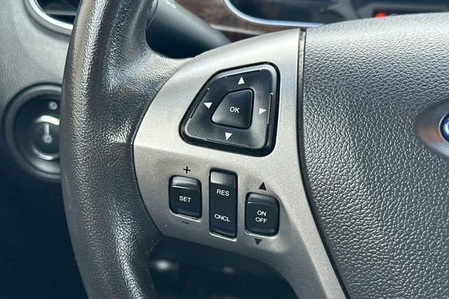 Photo of 2015 Tuxedo Black Metallic Ford Taurus