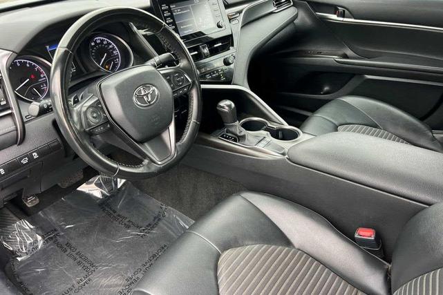 Photo of 2023 Midnight Black Metallic Toyota Camry