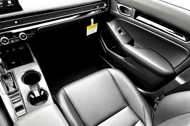 Photo of 2025 Platinum White Pearl Honda Civic Hybrid