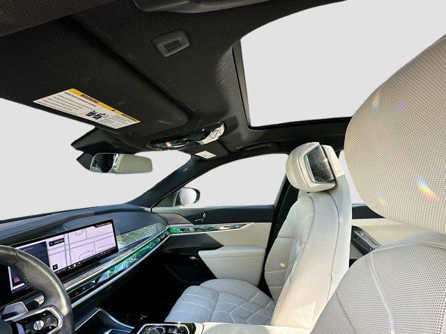 Photo of 2023 Carbon Black Metallic BMW 740