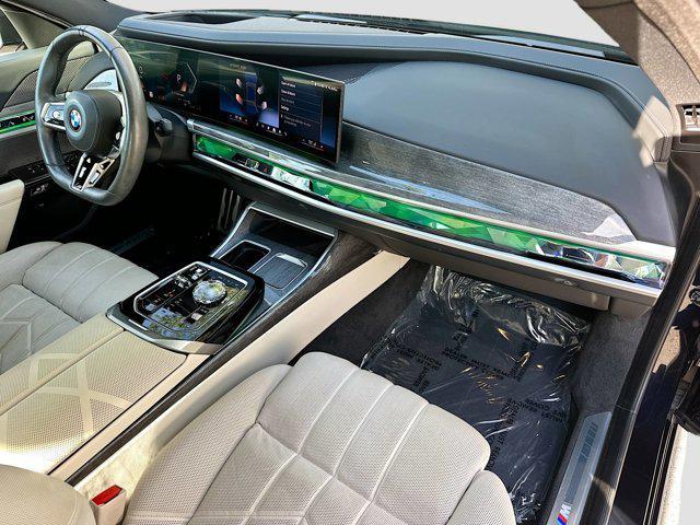 Photo of 2023 Carbon Black Metallic BMW 740
