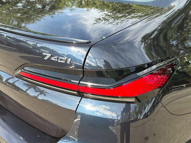 Photo of 2023 Carbon Black Metallic BMW 740