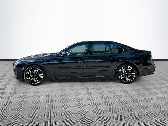 Photo of 2023 Carbon Black Metallic BMW 740