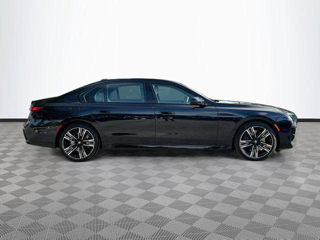 Photo of 2023 Carbon Black Metallic BMW 740
