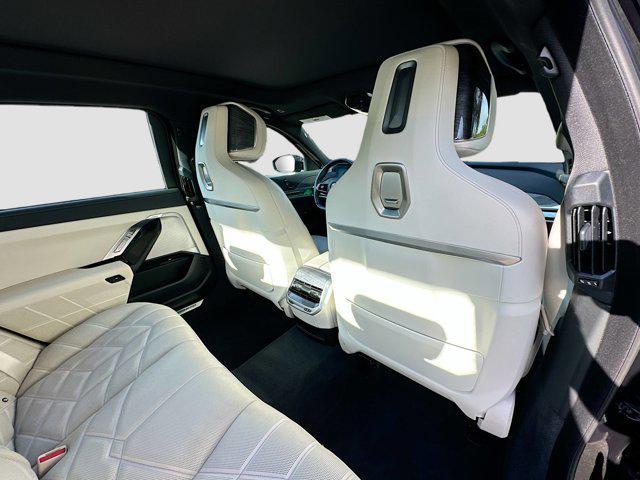 Photo of 2023 Carbon Black Metallic BMW 740