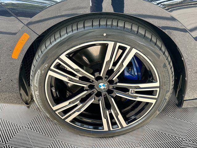 Photo of 2023 Carbon Black Metallic BMW 740