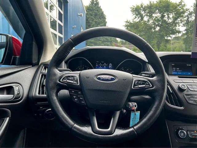 Photo of 2017 Ruby Red Metallic Tinted Clearcoat Ford Focus