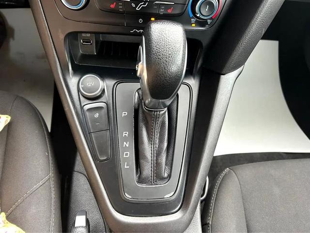 Photo of 2017 Ruby Red Metallic Tinted Clearcoat Ford Focus