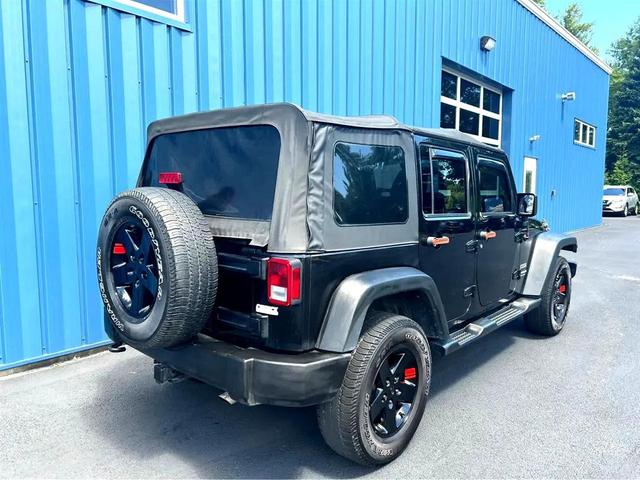 Photo of 2014 Black Clearcoat Jeep Wrangler Unlimited