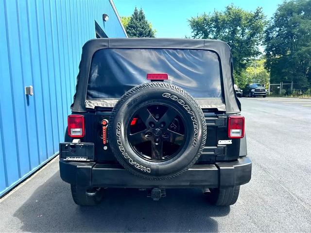 Photo of 2014 Black Clearcoat Jeep Wrangler Unlimited