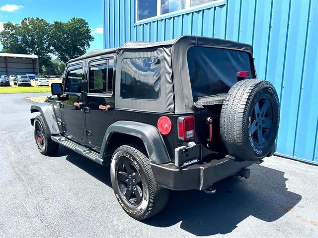 Photo of 2014 Black Clearcoat Jeep Wrangler Unlimited