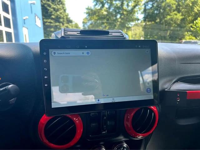 Photo of 2014 Black Clearcoat Jeep Wrangler Unlimited