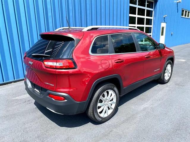 Photo of 2017 Deep Cherry Red Crystal Pearlcoat Jeep Cherokee