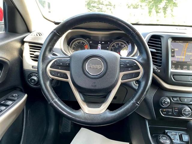 Photo of 2017 Deep Cherry Red Crystal Pearlcoat Jeep Cherokee