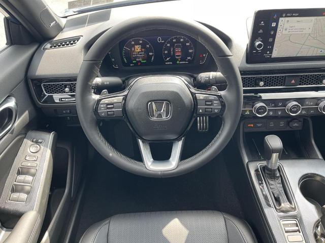 Photo of 2026 Blue Lagoon Honda Civic Hybrid