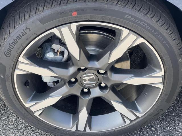 Photo of 2026 Blue Lagoon Honda Civic Hybrid