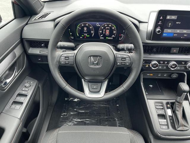 Photo of 2026 Radiant Red Metallic Honda CR-V Hybrid