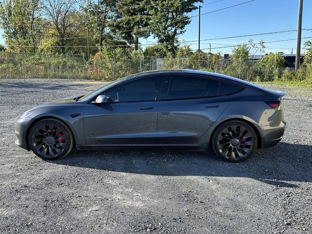 Photo of 2022 Midnight Silver Metallic Tesla Model 3