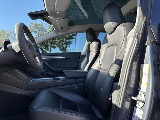 Photo of 2022 Midnight Silver Metallic Tesla Model 3